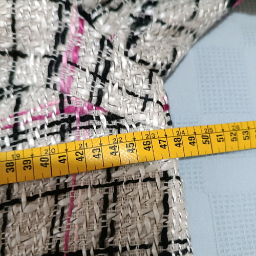 Coat used, no collar, fastens with studs, size M, white multicolor
