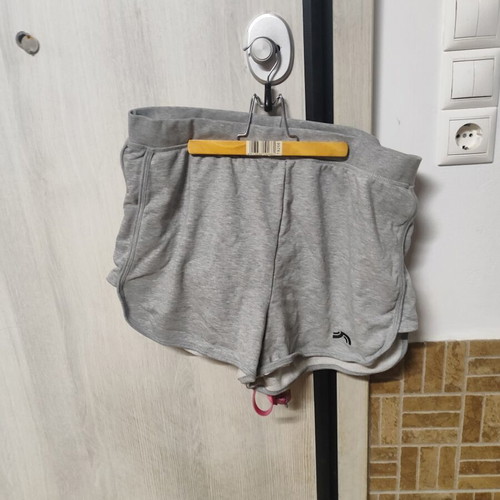 Grey sports shorts, size L