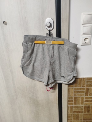 Grey sports shorts, size L