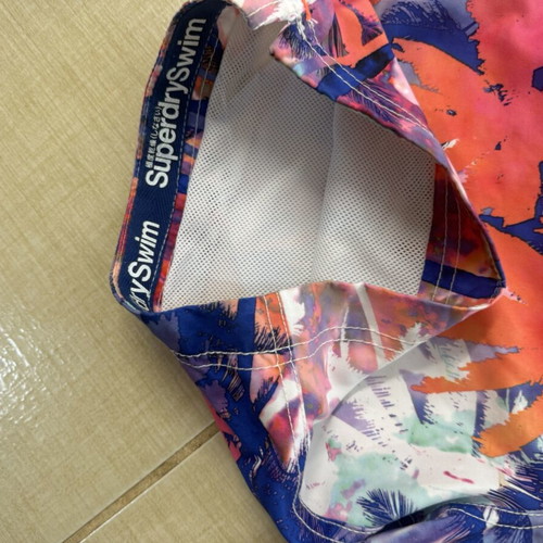 Superdry men's swim shorts with colorful tropical design, size L