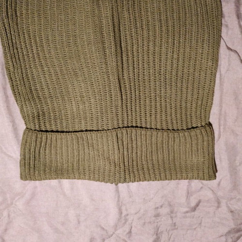 Knitted accessory new with wooden buttons