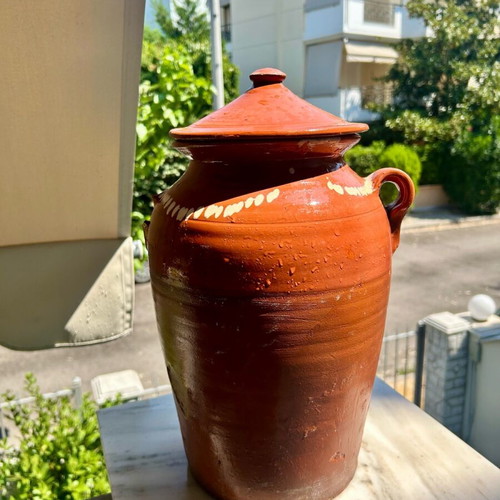 Old traditional ceramic jar used, handmade with lid