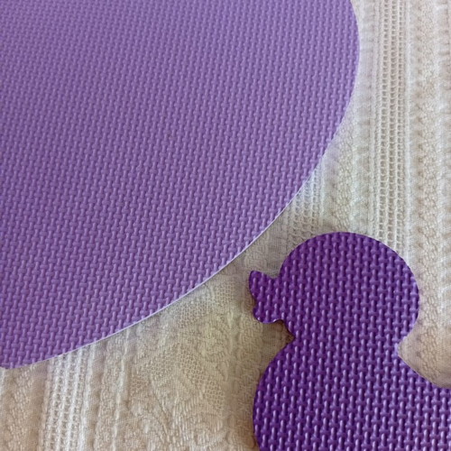 Large heart-shaped foam mat with small duck