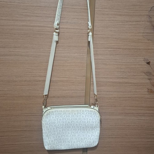 Crossbody bag used with compartments