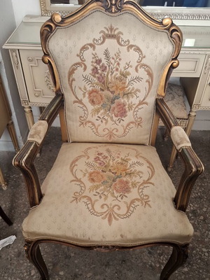 Louis XV armchair used with carved wood and floral upholstery