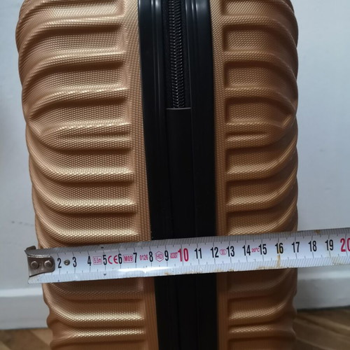 Small suitcase new, gold color