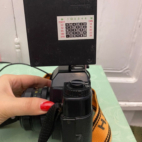 Vintage Zenit camera used with external flash