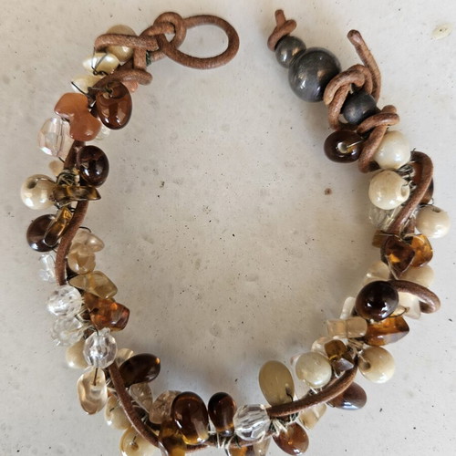 Women's bracelet with stones like new, beige and brown