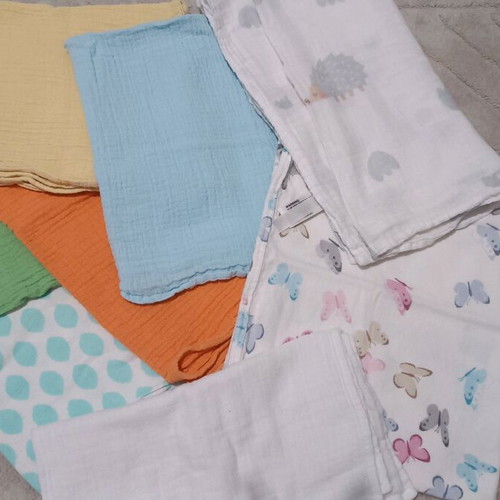 Baby muslin cloths like new, pack of 8 with changing mat cover
