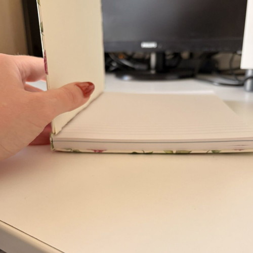 Agenda notebook with hard cover, missing some pages