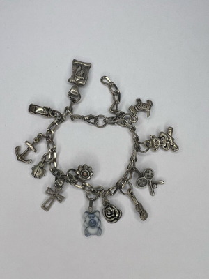 Bracelet with silver charms used, silver color