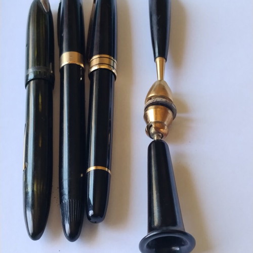 Sheaffer's vintage fountain pen set with 14K gold nibs and desk base, used
