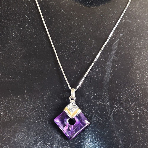 Vintage pendant with amethyst in 925 silver and gold