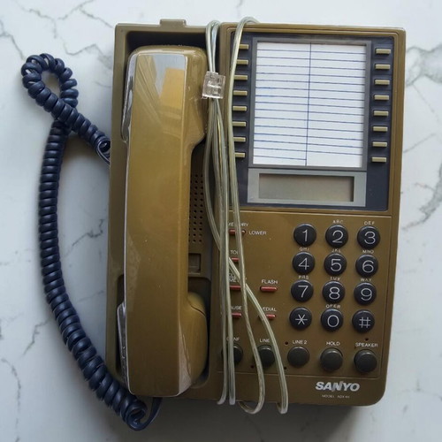 Sanyo ADX 66 phone used, vintage, brown, wired