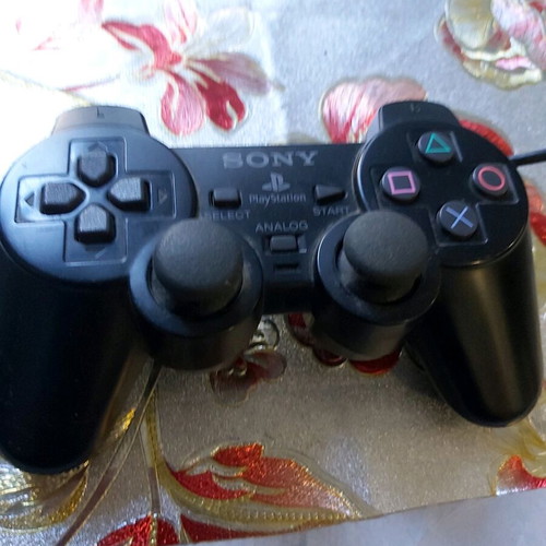 PlayStation 2 controller used, functional condition