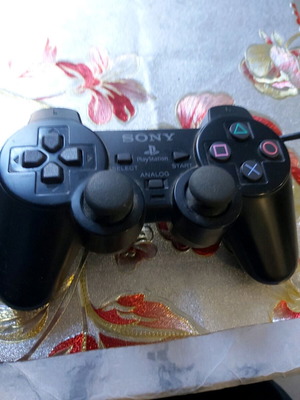 PlayStation 2 controller used, functional condition