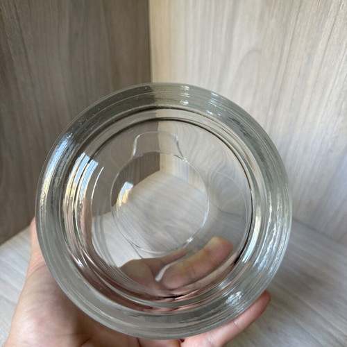 Glass ice bucket like new with handles and decorative matte engraving