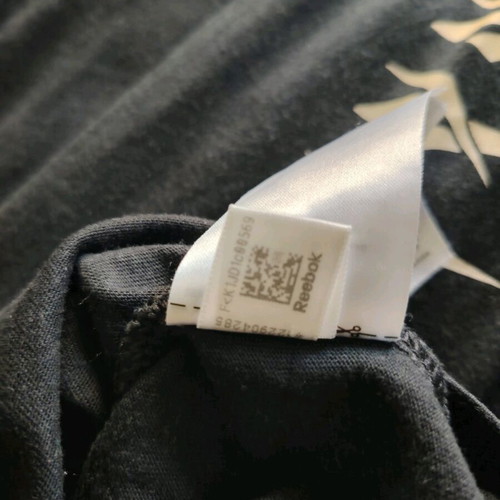 Reebok Long Sleeve Multi Vector Tee used, size L, black and yellow