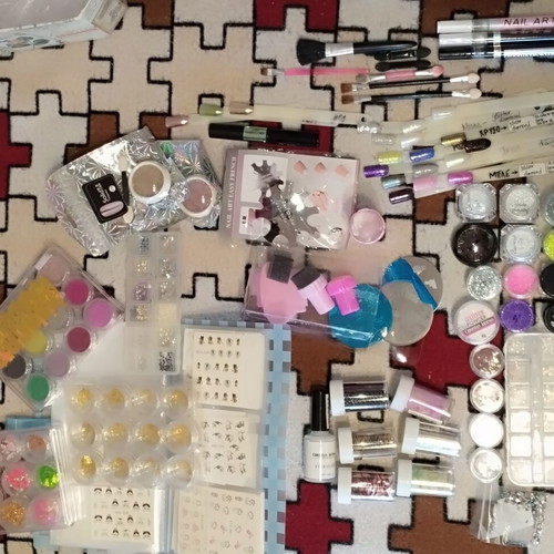 Large nail art set like new with glitter, foil, rhinestones, and decorations