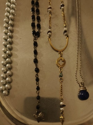 Collection of 4 pendants like new with precious stones