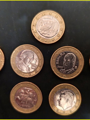 Collection of 7 one euro coins used, pack