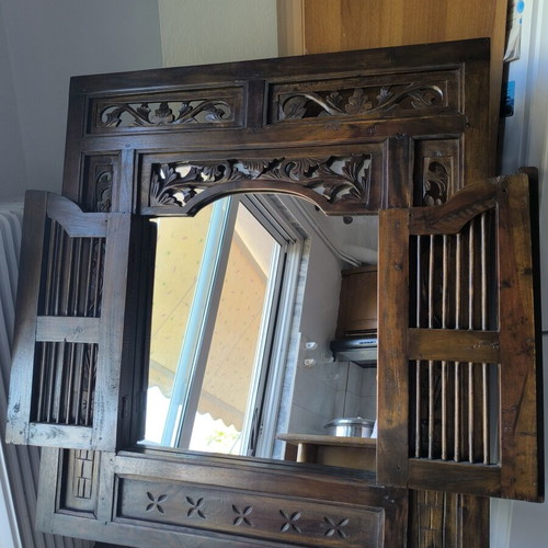 Wooden carved mirror with opening shutters like new