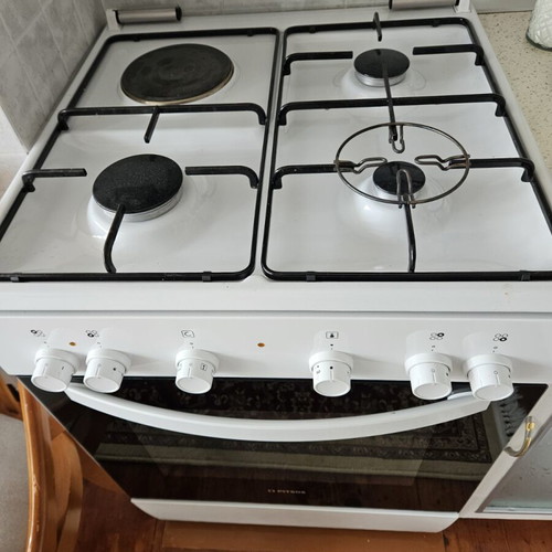 Gas stove with electric oven like new