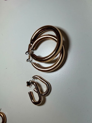Hoop earrings two pairs used, gold color, with minor wear