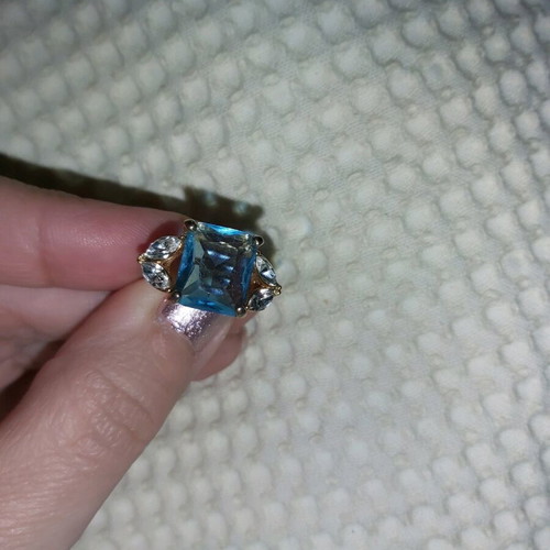 Ring with blue stone and 4 rhinestones, new, gold color