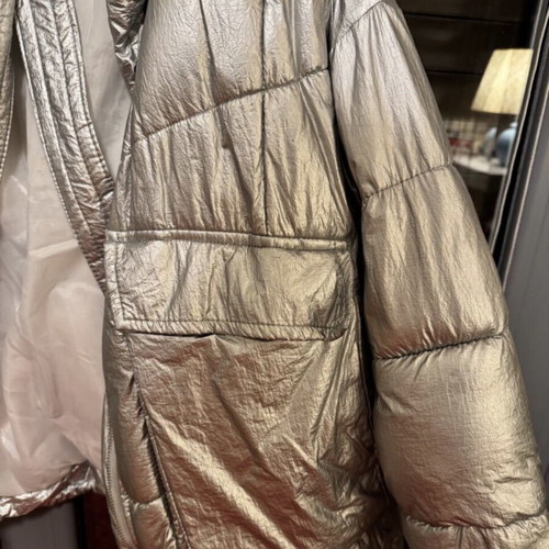 Silver jacket like new, very warm, one size with internal straps