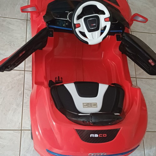 Electric children's car with light, music and remote control