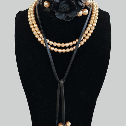 Two pearl necklaces like new, handmade leather chocker with flowers