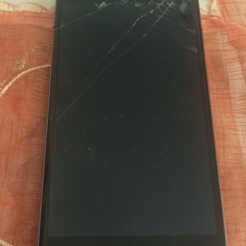 Coolpad TipTop Pro2 used, non-functional with broken screen and missing back cover for parts