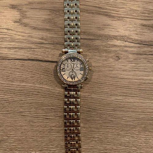 Golden wristwatch, women's