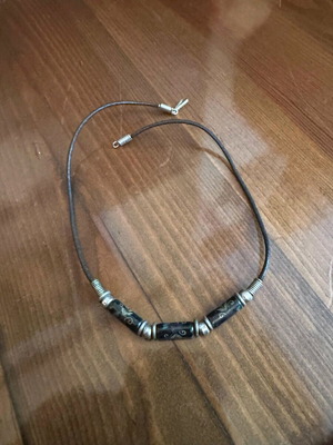 Necklace in like new condition, black and gray