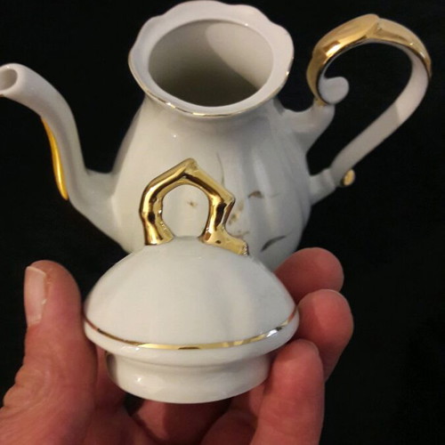 Vintage porcelain teapot and sugar bowl set like new