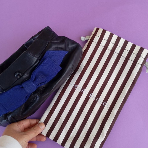 Henri Bendel black leather clutch like new, very soft genuine leather