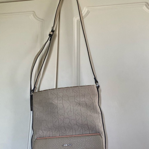 Calvin Klein crossbody bag used, beige with embossed logo