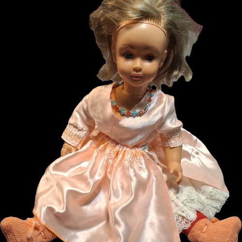 Vintage doll used with pink satin dress and knitted boots