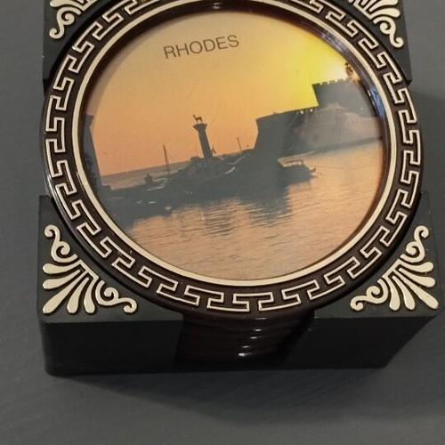 Vintage coaster set of 5 with original black holder from Rhodes
