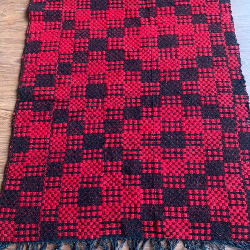 Machine-made wool rugs new with fringes and geometric patterns