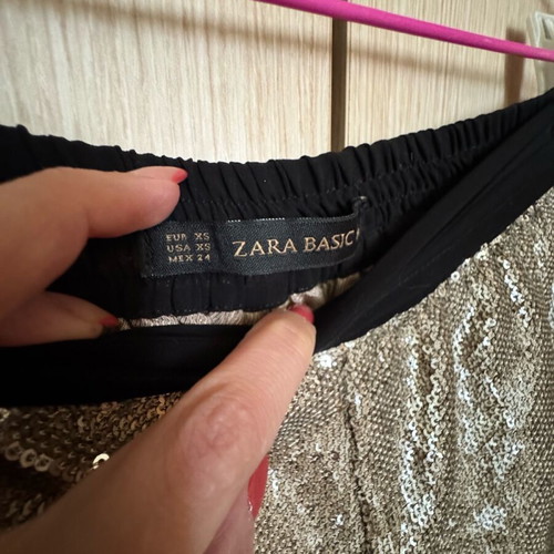 Mini Zara shorts like new with gold sequins and black elastic belt
