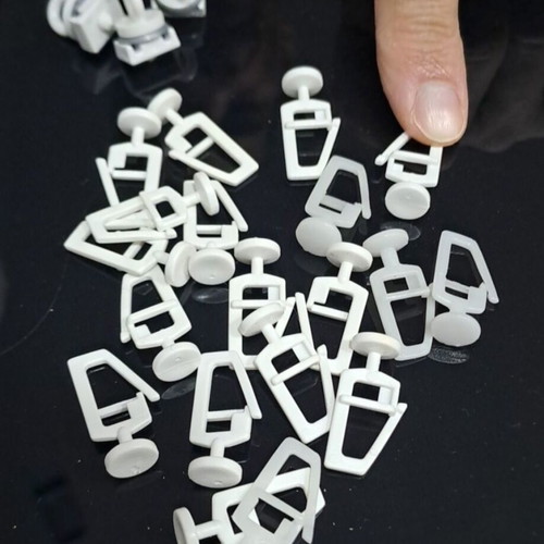Plastic curtain hooks like new