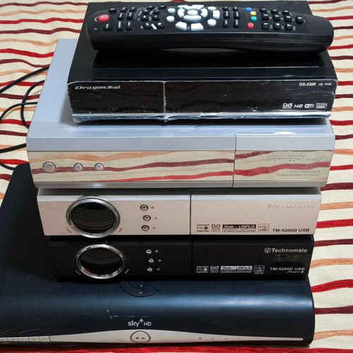 Satellite receivers and DVD player used for repair or spare parts