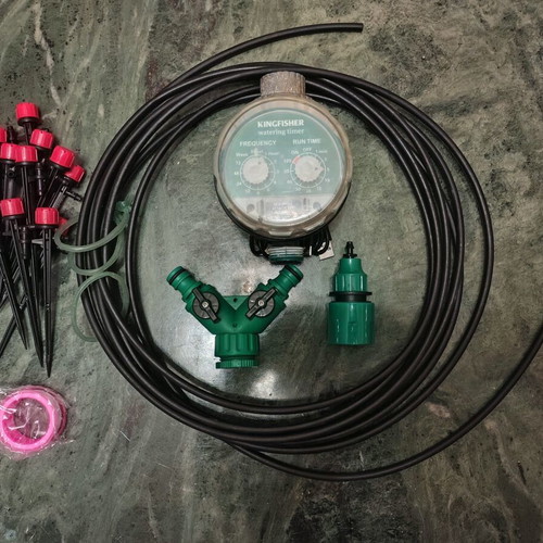 Kingfisher Analog Watering Timer used with hose pistol and accessories