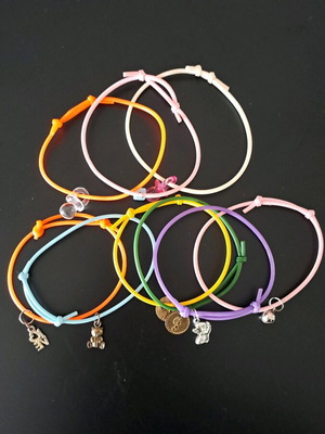 Handmade bracelets set with charms used, colorful silicone bands