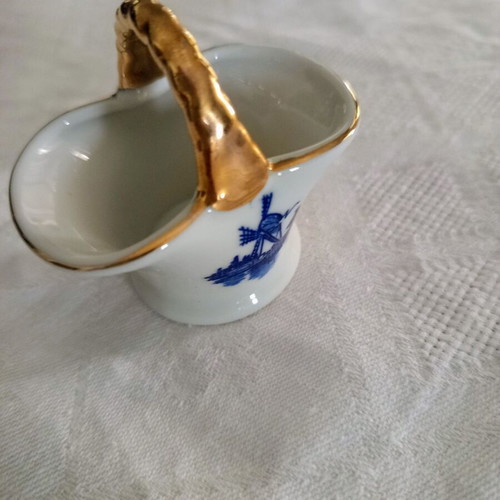 Porcelain decorative basket vintage with blue windmill and gold handle like new