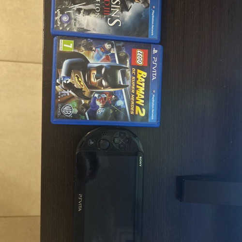 Psvita like new with 4 games