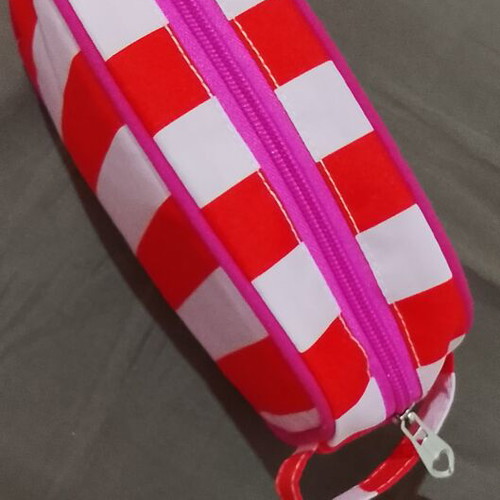 Aloe Colors toiletry bag, red and white striped