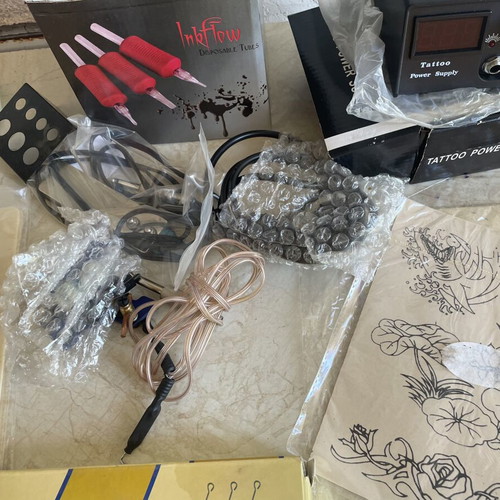 Dragonhawk Tattoo Coil Set used with extra practice materials